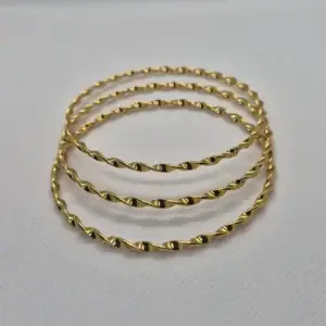 Bracelete Twist Torcido Banhado a Ouro Vallét