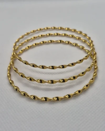 Bracelete Twist Torcido Banhado a Ouro Vallét